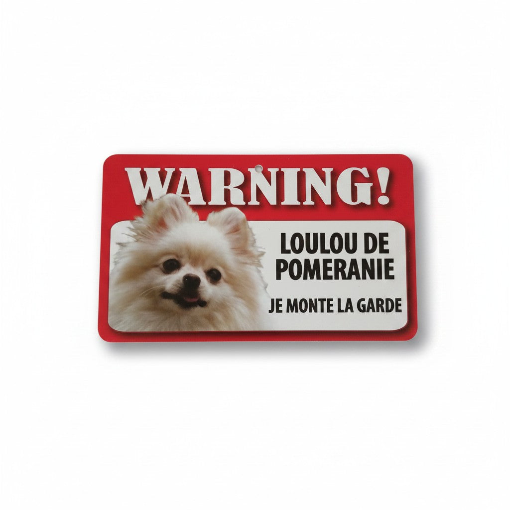 Plaque de signalisation rouge et blanche "Warning ! Loulou de Pomeranie je monte la garde" avec la photo d'un chien Loulou de Pomeranie