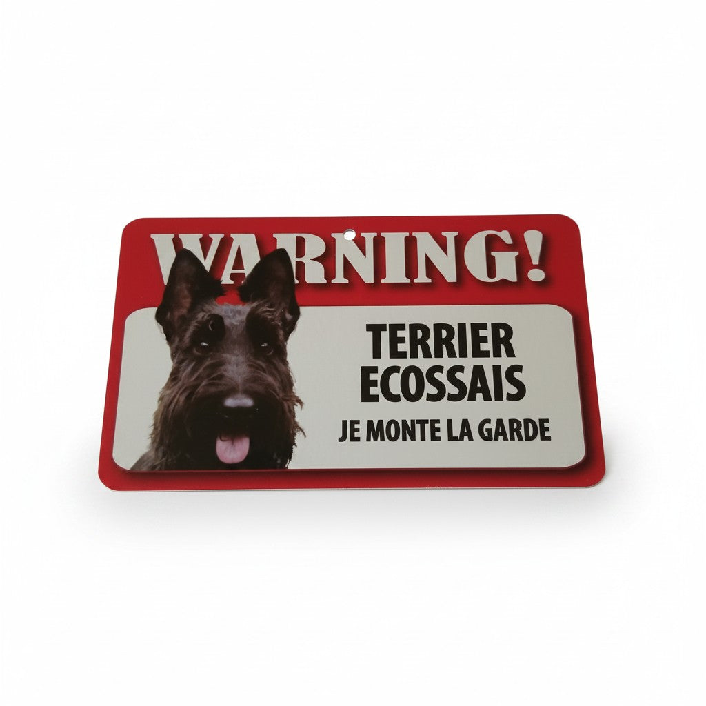 Plaque de signalisation rouge et blanche "Warning ! Terrier écossais je monte la garde" avec la photo d'un chien Terrier écossais