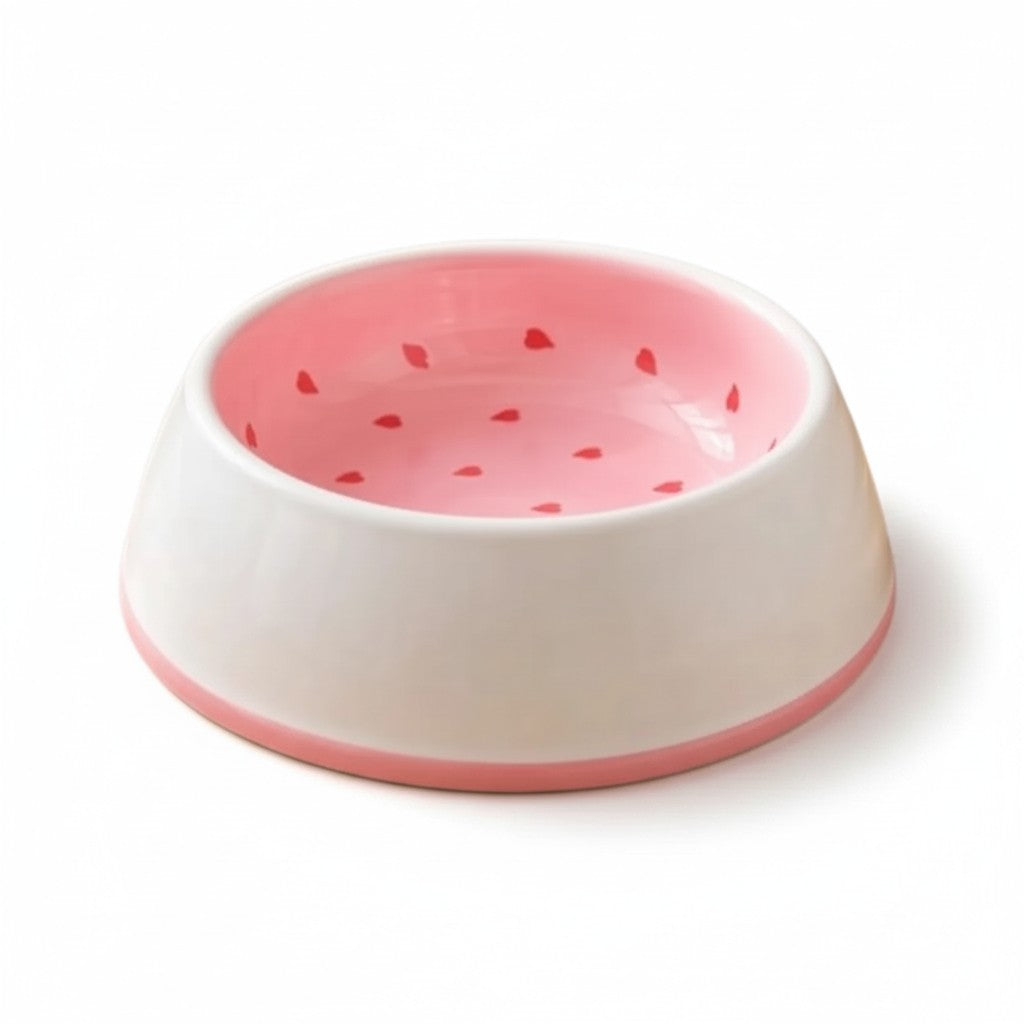 Gamelle en céramique blanche à liseré rose, intérieur rose avec petits pépins rouge, motif fraise